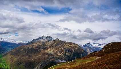 Panoramic view of the Swiss Alps near the municipality of Andermatt in autumn.