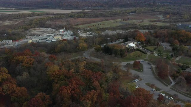 Aerial view of Ault Park with its autumn foliage, winding paths, and structures, a serene landscape, Cincinnati, Ohio, United States.