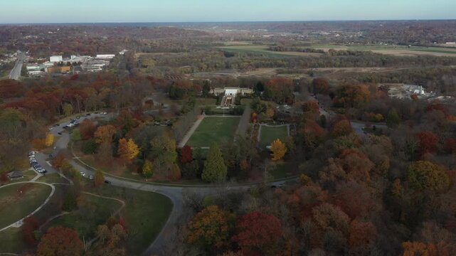 Aerial view of Ault Park, where winding roads meet the natural beauty of the landscape, showcasing vibrant fall colors, Cincinnati, Ohio, United States.