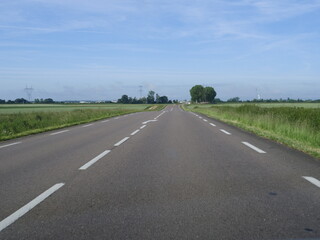  A view of a nice empty road in spring. Burgundy, France - May 29, 2025. 