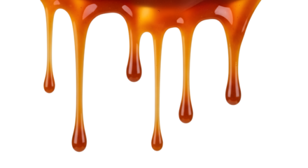 Thick amber caramel sauce dripping in viscous strands isolated on a transparent background liquid sweet