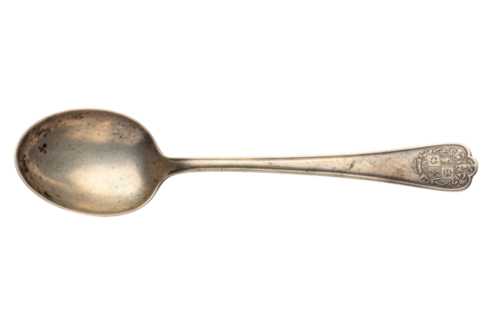 Antique tarnished silver spoon with an ornate crested handle isolated on a transparent background - Powered by Adobe