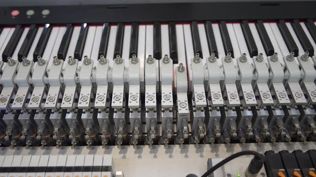 robot with vacuum suckers play with Keyboards,Smart factory industry 4.0 concept