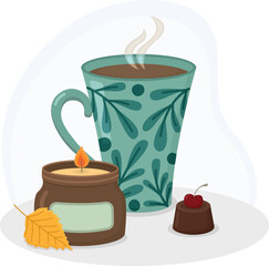 Still life with lit candle in jar, steaming cup of tea, chocolate candy with cherry and yellow leaf. Cozy autumn composition