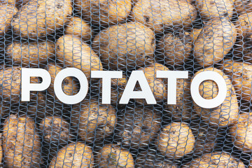 a grid with potatoes on which the letters are located, the word potato is made of them
