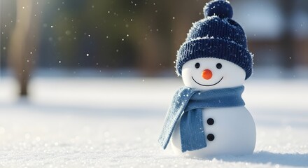 Smiling snowman with blue scarf in winter landscape