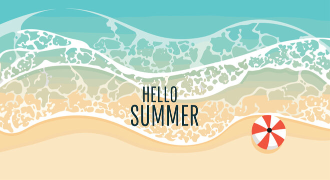 An aerial view of a beach with the words HELLO SUMMER written on the foamy waves and a red and white umbrella on the sand.