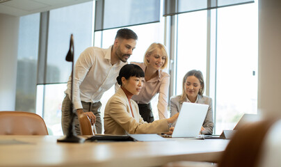 Team collaboration in a modern office during a brainstorming session in the afternoon