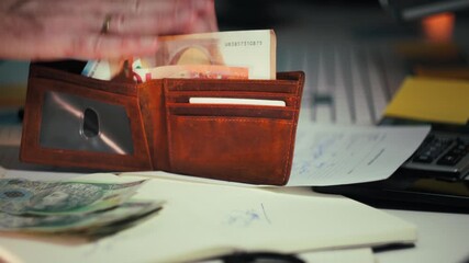 counting euro zloty banknotes currency exchange Close-up view of mixed euro Polish zloty bills being handled cluttered desk, symbolizing finance, international money flow budgeting - Powered by Adobe