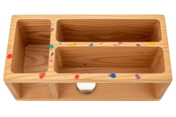 Wooden desk organizer with compartments and colorful paint splatters isolated on transparent background