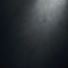 Dark minimal spotlight creating soft abstract gradients across smooth surface forming atmospheric elegant background
