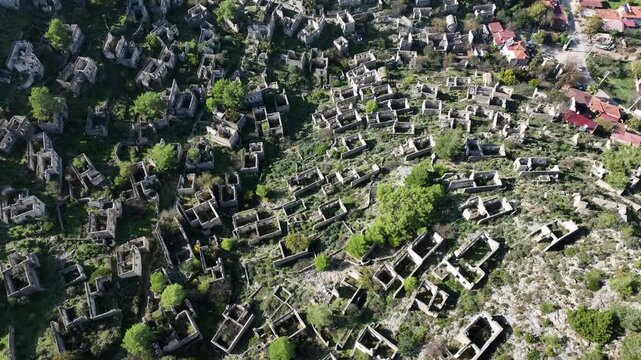 Historical village of Kayak&ouml;y featuring ruins, hills, and ancient settlement structures