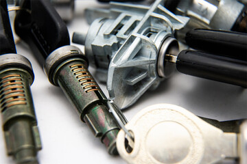 Keys, cylinders and tumblers