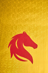 2026 Chinese New Year. Red Horse shape on golden ornate background