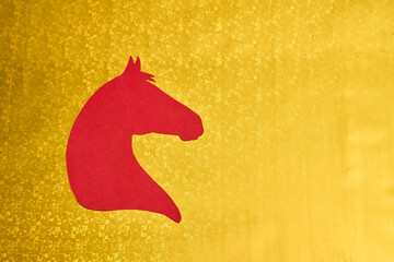 Red Horse Symbol on Golden Festive Background for Chinese New Year 2026