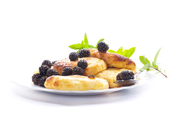 Sweet cottage cheese cakes with pine cone dessert topping