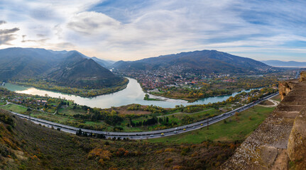Panoramic view of the Aragvi and Kura rivers confluence and Mtskheta city seen from Jvari monastery © vahanabrahamyan