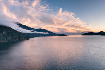 Sunset Over Coastal Mountains and Calm Waters in British Columbia, Canada