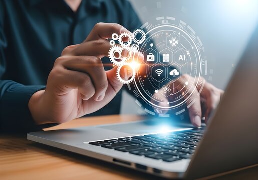 Businessman interacting with futuristic technology interface on laptop