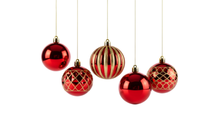 Five red and gold christmas ornaments hanging against a black background