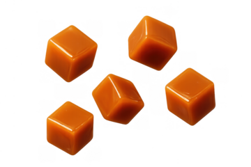 Caramel candies floating, sweet toffee cubes, and fudge snack confectionery. Delicious sugar food on a transparent background