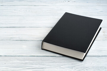 book on a white wooden table. Back to school. Education business concept.