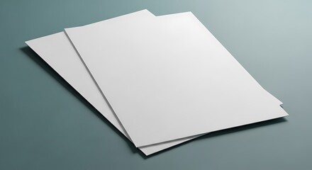 Two blank white sheets of paper overlapping on a clean bluegrey background, perfect for mockups, presentations, or design elements