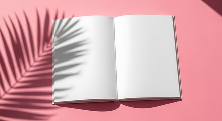 An open blank notebook with empty pages for text or design, featuring a tropical palm leaf shadow on a vibrant pink background