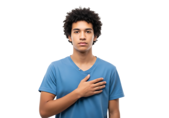 a portrait of a young man with curly dark hair wearing a light blue v neck shirt and hand on chest on transparent