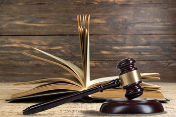 Law and Justice, Legality concept, Judge Gavel on a wooden background, Law library concept.