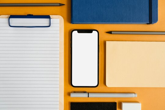 Office supplies with smartphone mockup