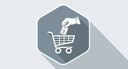 Hand placing dollar bill into shopping cart