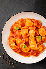 Beef ravioli tomato sauce main course tasty snack fresh delicious gourmet food on the table rustic food top view copy space