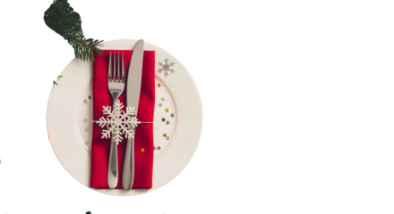 Elegant christmas place setting with snowflake napkin ring and holly garnish