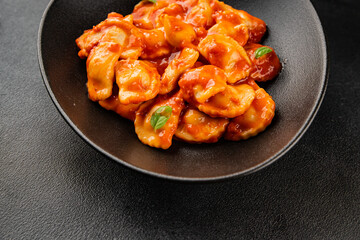 Beef ravioli tomato sauce main course tasty snack fresh delicious gourmet food on the table rustic food top view copy space