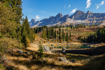 Scenic autumn landscape of Carezza lake or Lago di Carezza, Karersee in Dolomites Alps, South Tyrol, Italy, Europe	