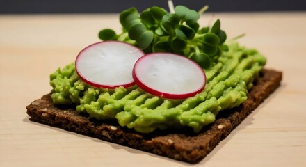 Rye crispbread with avocado spread close-up for wholesome vegan open-faced snack and minimalist lifestyle