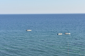 Obraz premium Sea view from Selinunte Archaeological Park, Trapani, Sicily, Italy. Travel to Italy. Sightseeing in Sicily. Summer and Holidays. Sicilian sea. Boats. 
