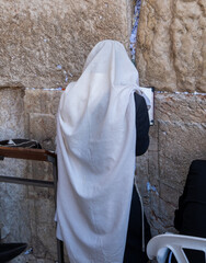 Ultra-religious orthodox males pray at the Western Wall, Jerusalem