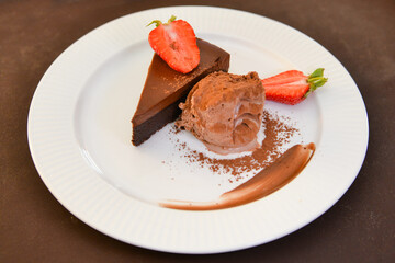 Piece of chocolate brownie cake. Delicious homemade dessert.