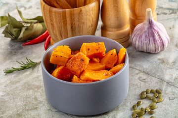 Vegan cuisine - baked pumpkin with herbs