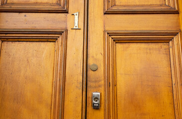 Detail of wooden front door at number 1 - a house in the Victorian suburb of Morningside, Edinburgh, Scotland, UK