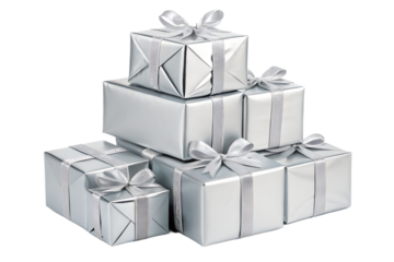 A shiny pyramid of silver Christmas gift boxes wrapped in metallic foil and decorated with elegant silver bows. The bright reflective surfaces create a clean, modern, festive look. Perfect for winter 