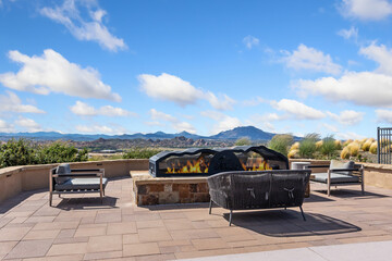 elegant mountain retreat, stylish outdoor seating area, beautiful panoramic view with cozy