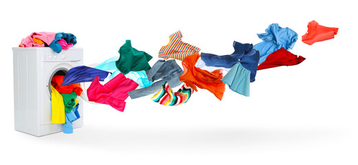 Obraz premium Washing machine and flying laundry on white background