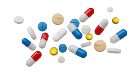 Assorted red white and blue capsules and white and tan pills scattered medicine pharmaceutical