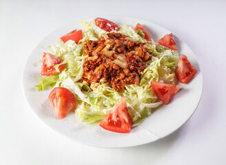 taco rice salad. A balanced mix of textures and flavors, featuring seasoned beef, fresh lettuce, cheese, and tomatoes. Perfect for lunch or dinner.