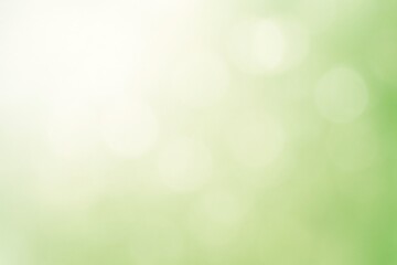 Soft green bokeh background creating a natural light effect for clean abstract design elements