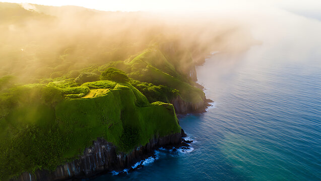 Misty morning aerial view of lush green cliffs meeting the ocean in a tropical paradise - Powered by Adobe