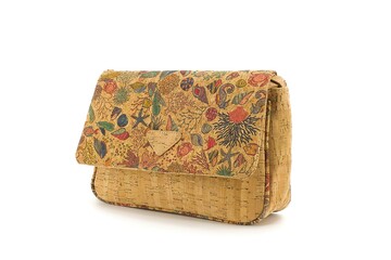 Soft cork handbag with bright printed flap and curved lines.